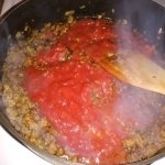 Tomato sauce added to beef