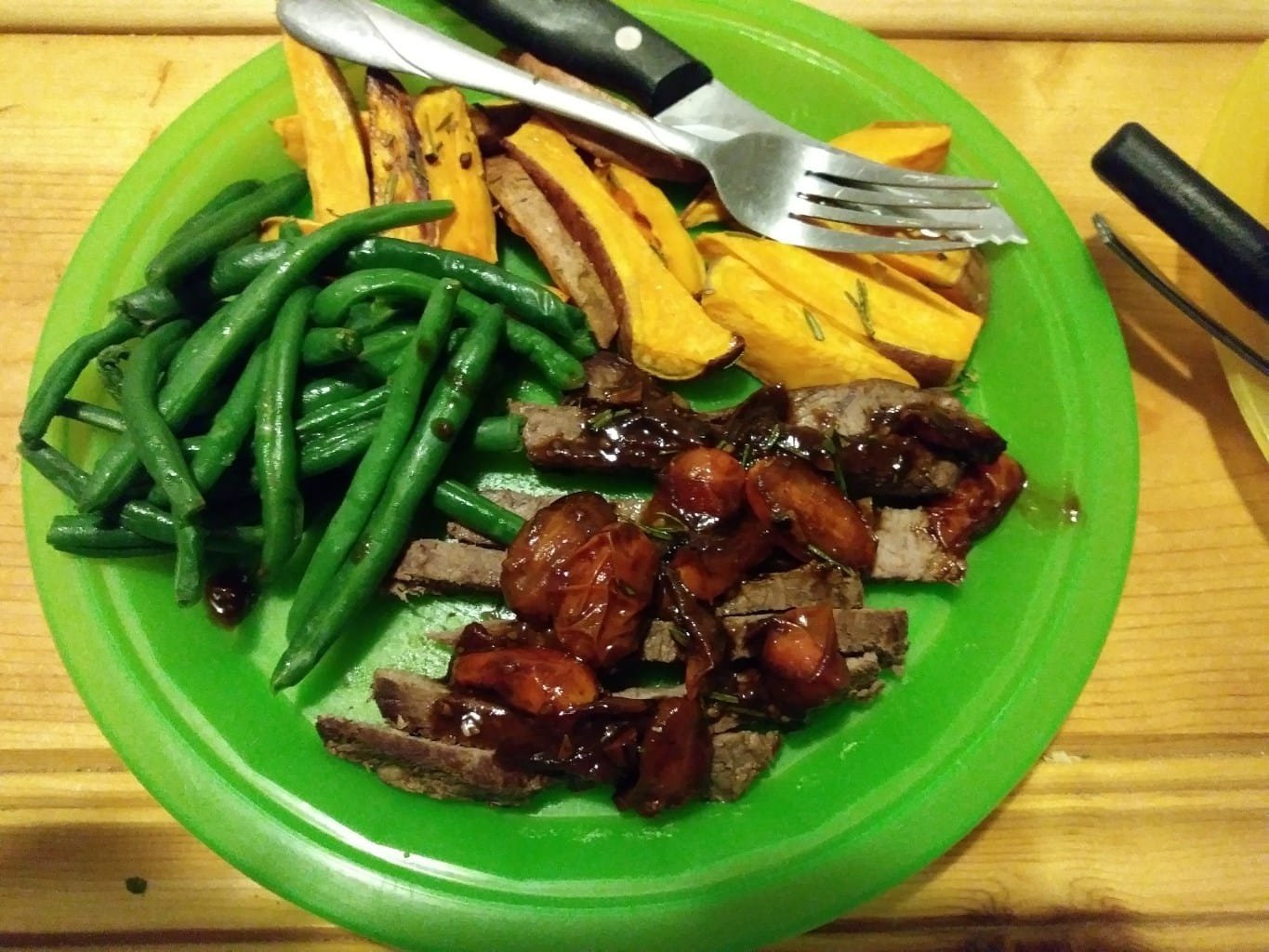 Sliced Steak Tagliata with Sweet Potatoes, Green Beans, and Tomato Vinaigrette