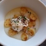 French Onion Shrimp and Grits plated dish