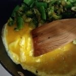 Add egg to broccoli mix