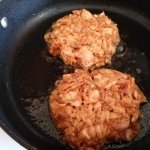 Salmon patties in pan