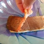 Peeling skin off of salmon