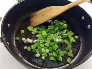 Saute green pepper and scallion whites