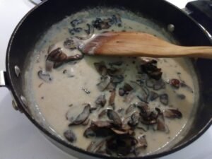 Add mushrooms to sauce