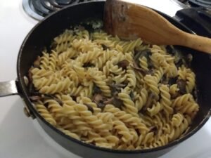 Add pasta to sauce