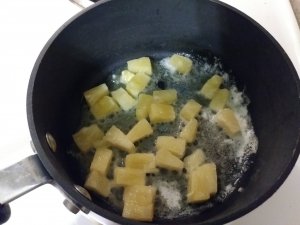 Add pineapple to butter